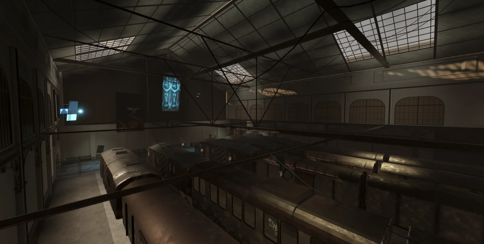 Industrial train station hall beneath metal roof beams