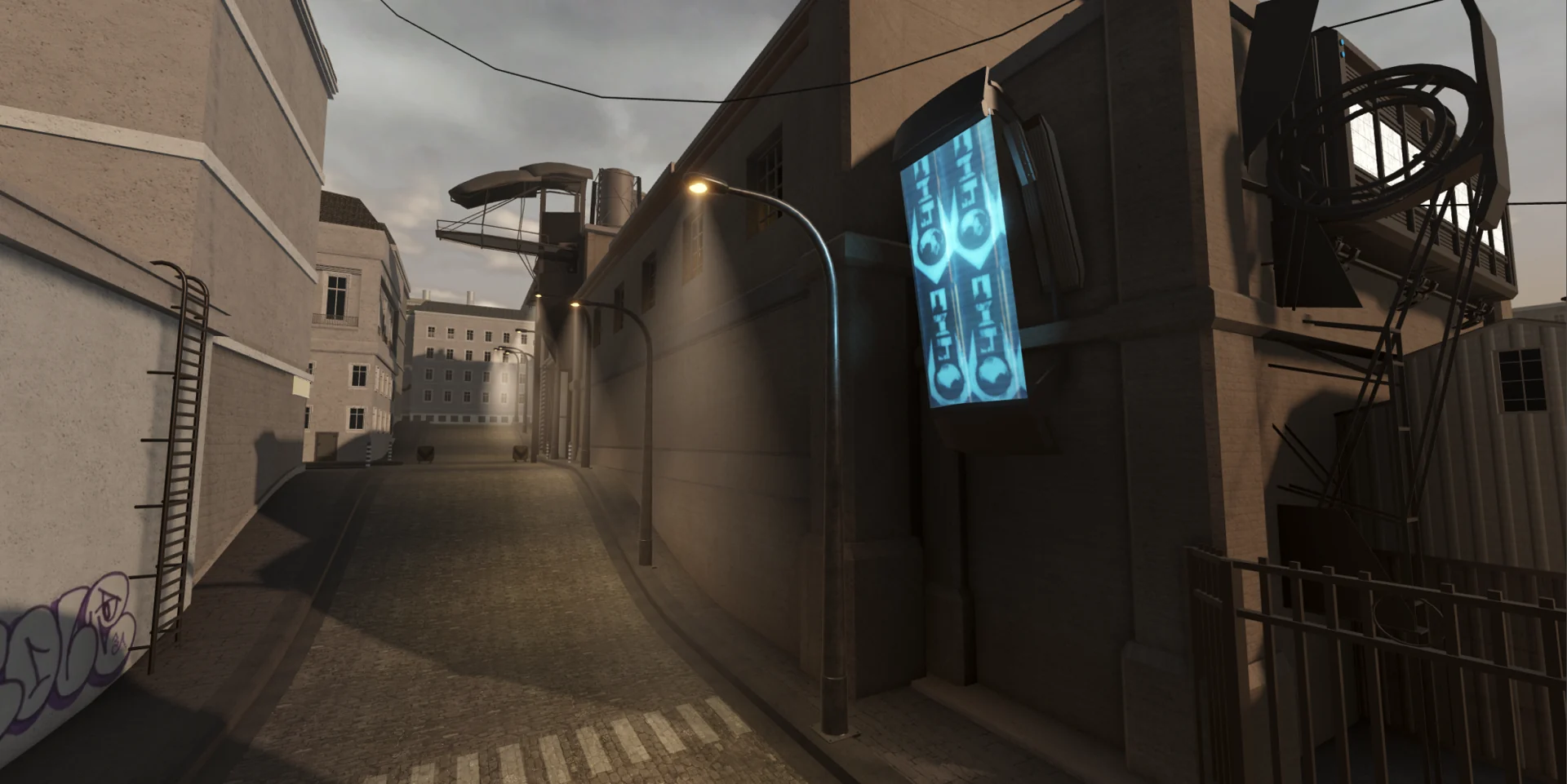 Narrow city street with overhead cables and warm sunlight
